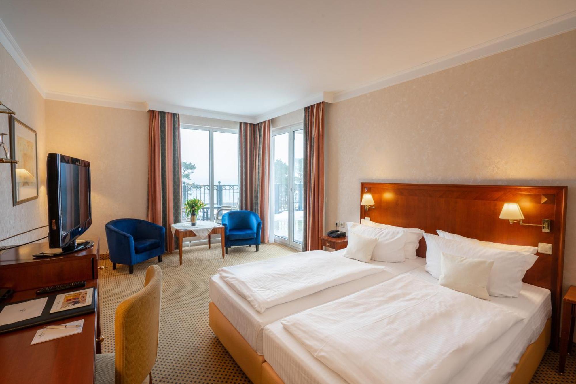 Grand Hotel بينز المظهر الخارجي الصورة A typical hotel room