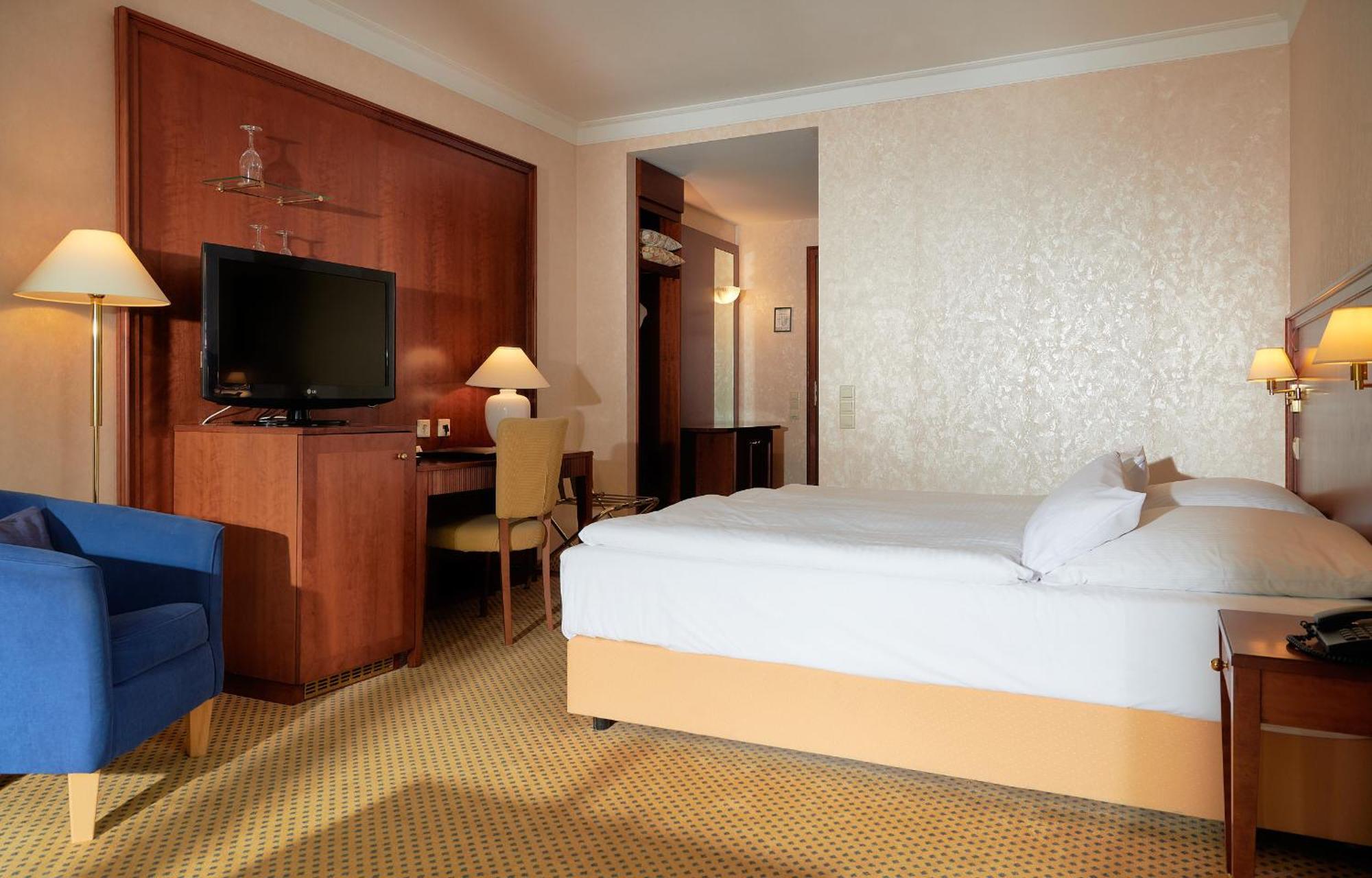 Grand Hotel بينز المظهر الخارجي الصورة A typical room at the hotel